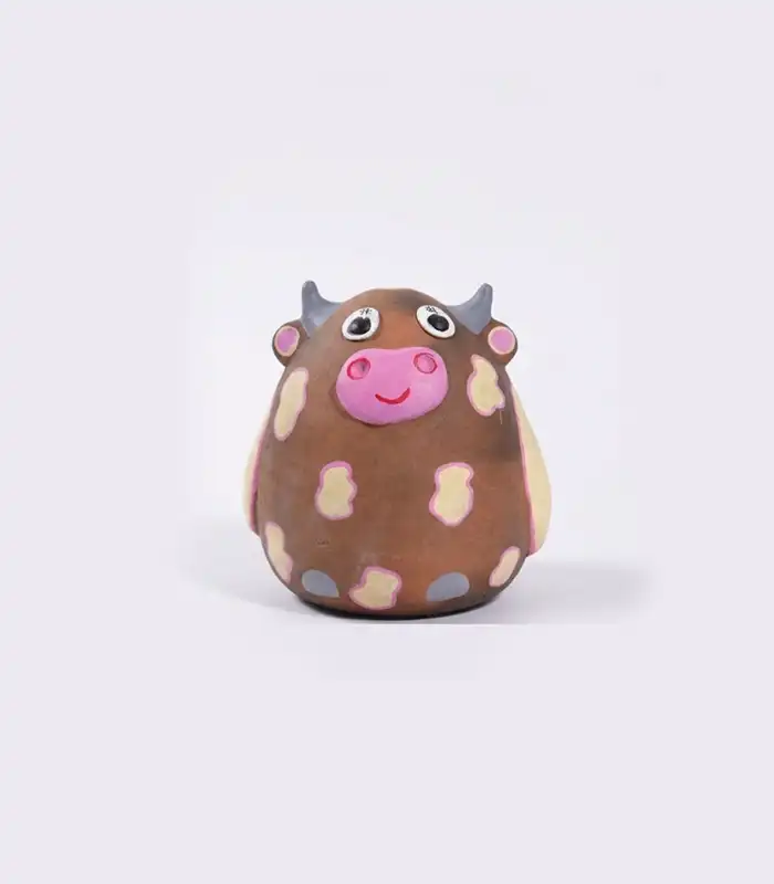 Handmade terracotta cow piggy bank by Pipihiri