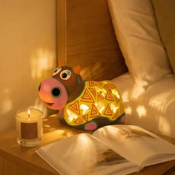 Terracotta cow candle holder - handmade tealight cover by Pipihiri