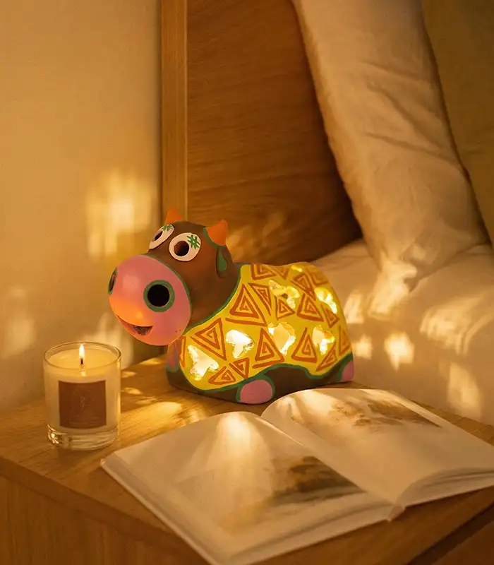 Terracotta cow candle holder - handmade tealight cover by Pipihiri